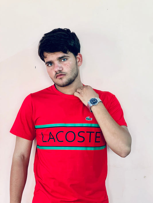Man wearing Lacoste red slim fit t-shirt with logo print and green stripes by Flaxwears